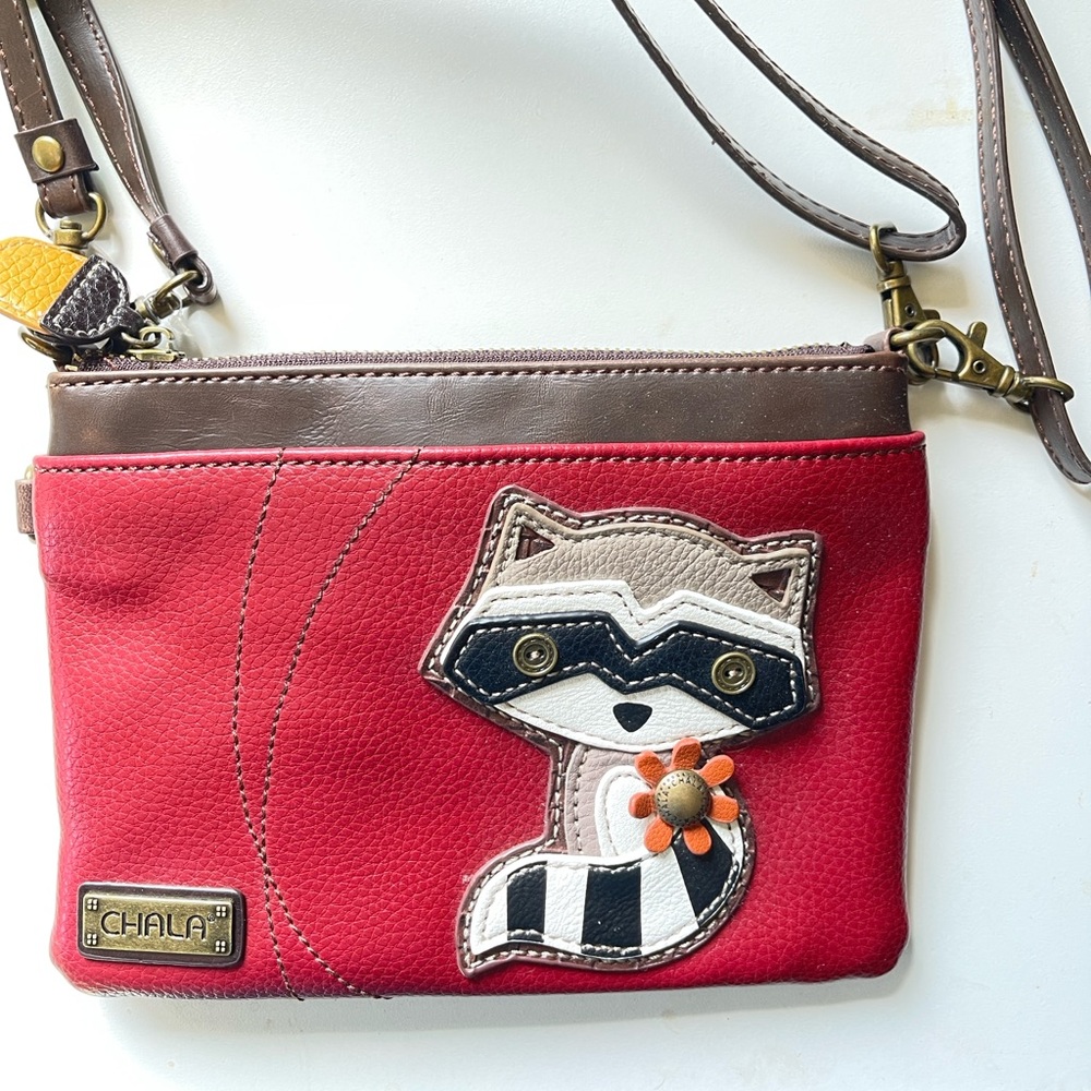 Chala wristlet or over shoulder purse with raccoon